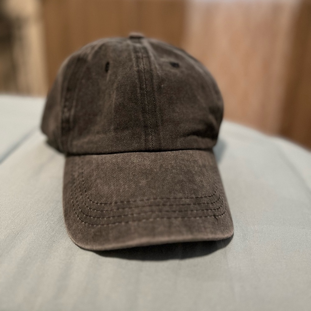 Women’s Baseball Cap
Classic black acid wash with ponytail opening.